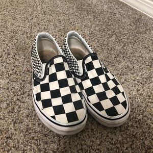 Checkerboard slip-on vans